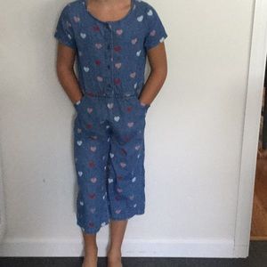 Girls blue button up romper with hearts
